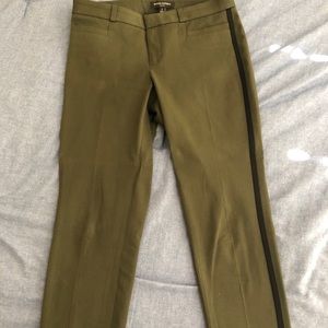 Green slacks with black stripe down the side
